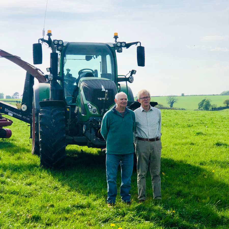 Farmers and tractor at the farm